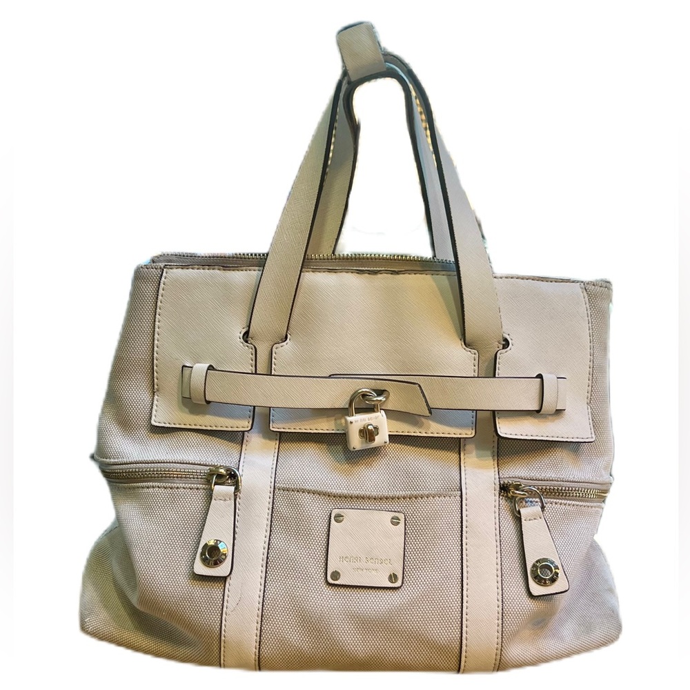 Henri Bendel Jetsetter convertible backpack with purple interior lining. - Picture 2 of 15